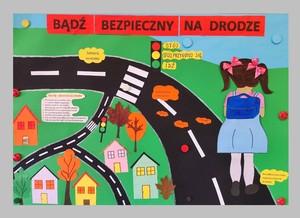 Plakat zrobiony przez dzieci, tak zwana wyklejanka, dotycząca bezpieczeństwa na drodze.