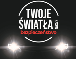 Grafika obrazująca prowadzone działania. Biały napis na czarnym tle o treści: Twoje światła-nasze bezpieczeństwo. Pod napisem zapalone przednie światła pojazdu na czarnym tle.