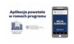 Grafika obrazkowa. Po lewej stronie informacja tekstowa Aplikacja powstała w ramach programu dzielnicowy bliżej nas. Pod napisem grafika w postaci budynków, z których środkowy ma napis Policja. Po prawej stronie smartfon z uruchomioną aplikacją Moja Komenda.