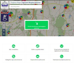 Zrzut ekranu z aplikacji Krajowej Mapy Zagrożeń Bezpieczeństwa. Mapa z naniesionymi zagrożeniami. Na środku wygląd ikonki umożliwiającej zgłaszanie miejsc przebywania osób bezdomnych. Biały piktogram osoby siedzącej przy księżycu na zielonym tle.