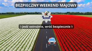 Grafika obrazkowa. Pionowo przez środek zdjęcia przebiega droga. Po jej lewej stronie rosną białe, a po prawej stronie czerwone kwiaty. U góry znajduje się napis o treści: Bezpieczny weekend majowy, a poniżej: Jedź ostrożnie, wróć bezpiecznie. W centralnym miejscu zdjęcia znajduje się gwiazda policyjna.