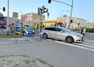 Miejsce wypadku, interweniujące służby, uczestniczące pojazdy.